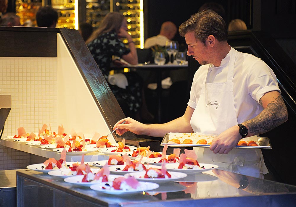 An Image of Adam Handling MBE / his food at Signature Food Festival 2024
