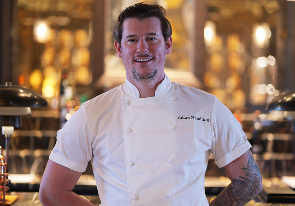 An Image of Adam Handling MBE / his food at Signature Food Festival 2024