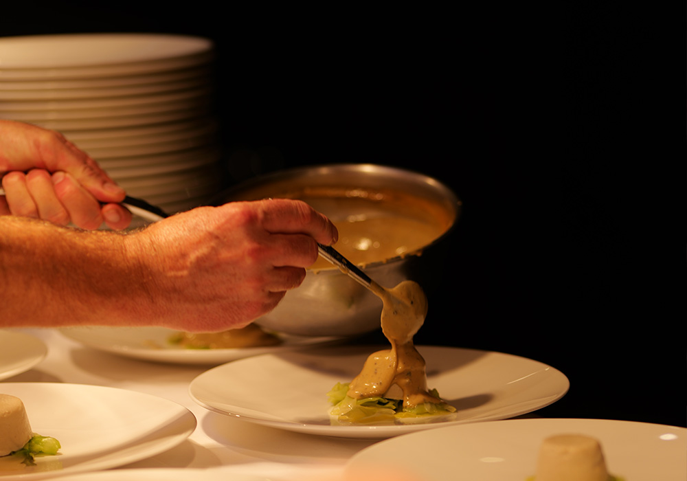 An Image of Martin Wishart prepping at Signature Food Festival 2024